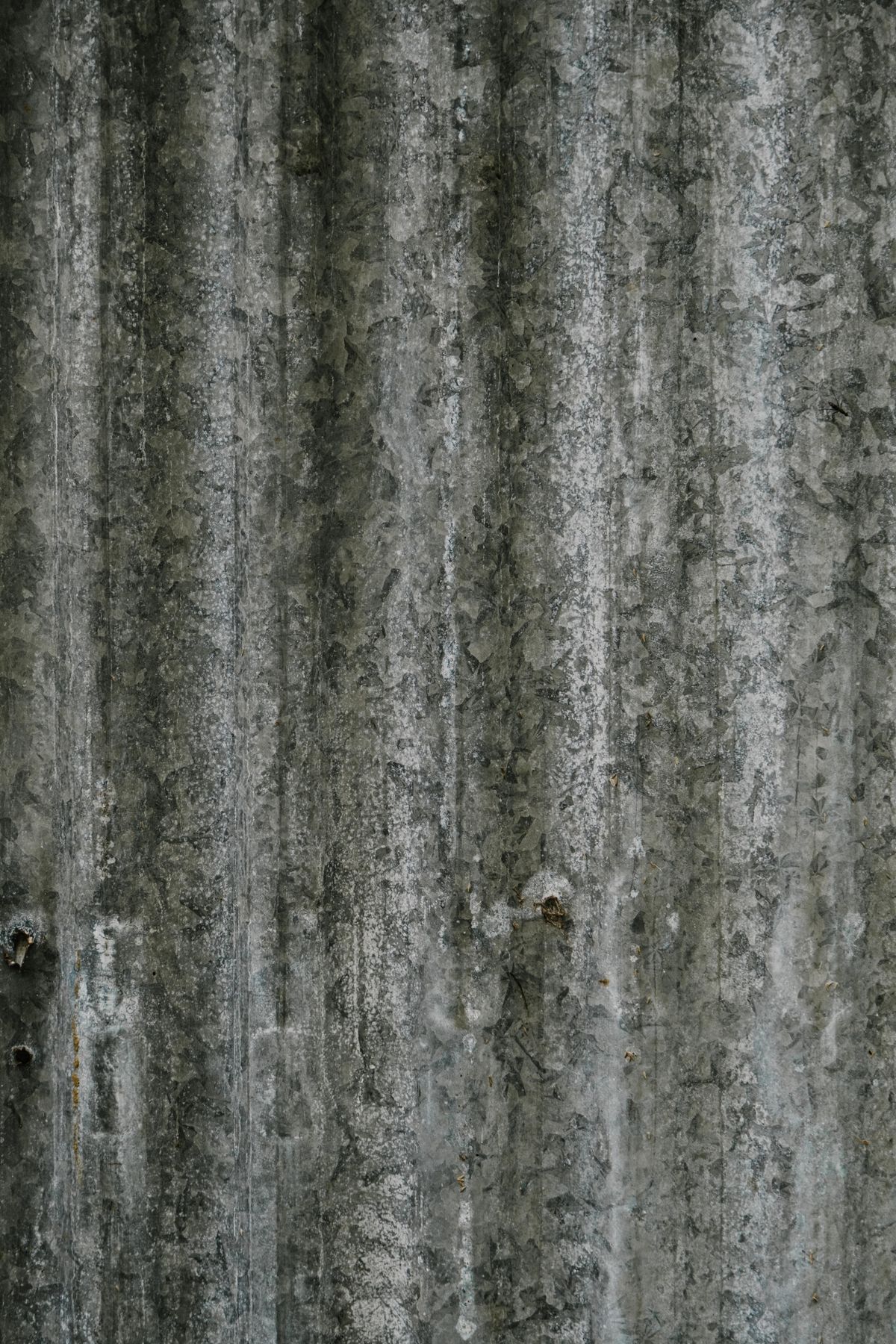 Close-up of a textured steel sheet surface representing engineering material data