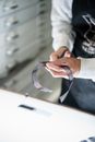 Close-up of a Person Cutting Pictures