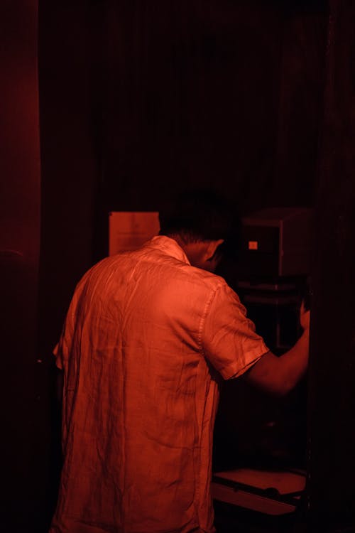 Man in Darkroom