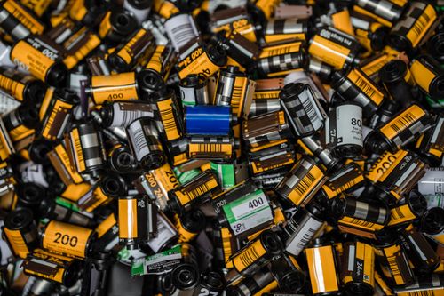 Free Explore a vast collection of colorful vintage film rolls captured in a detailed close-up. Stock Photo