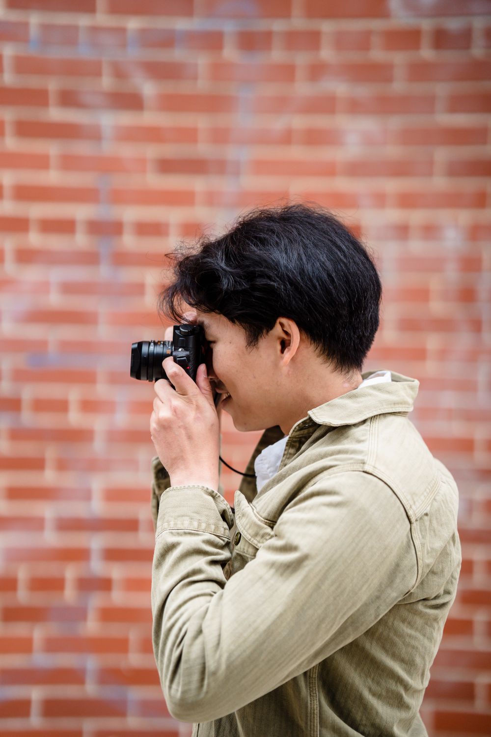 Photo of Man Using Camera · Free Stock Photo