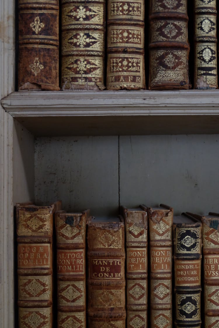 Close-up Of Antique Books On A Bookshelf 