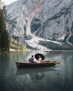 Person Riding on Boat on Lake