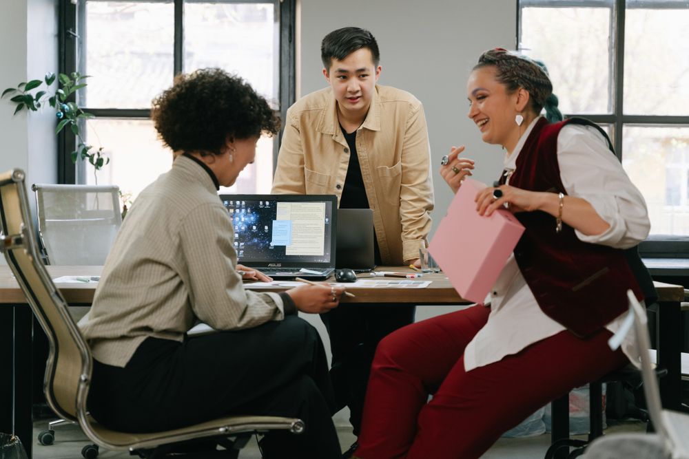 Small team collaborating at a table