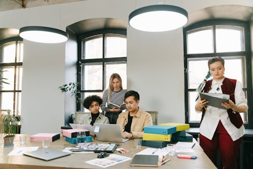 Busy Employees Working Together in the Office