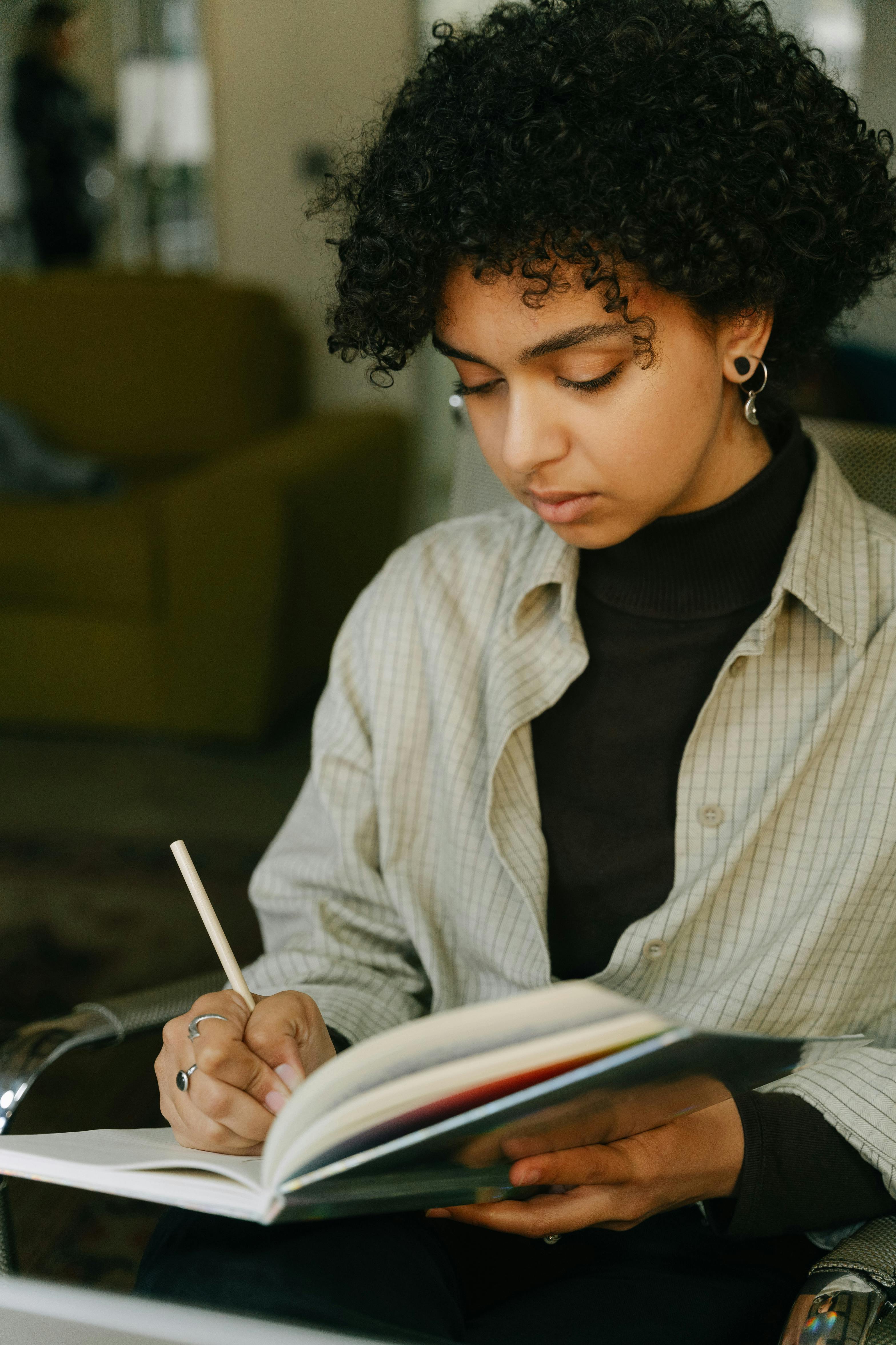 A Woman Reading a Book · Free Stock Photo