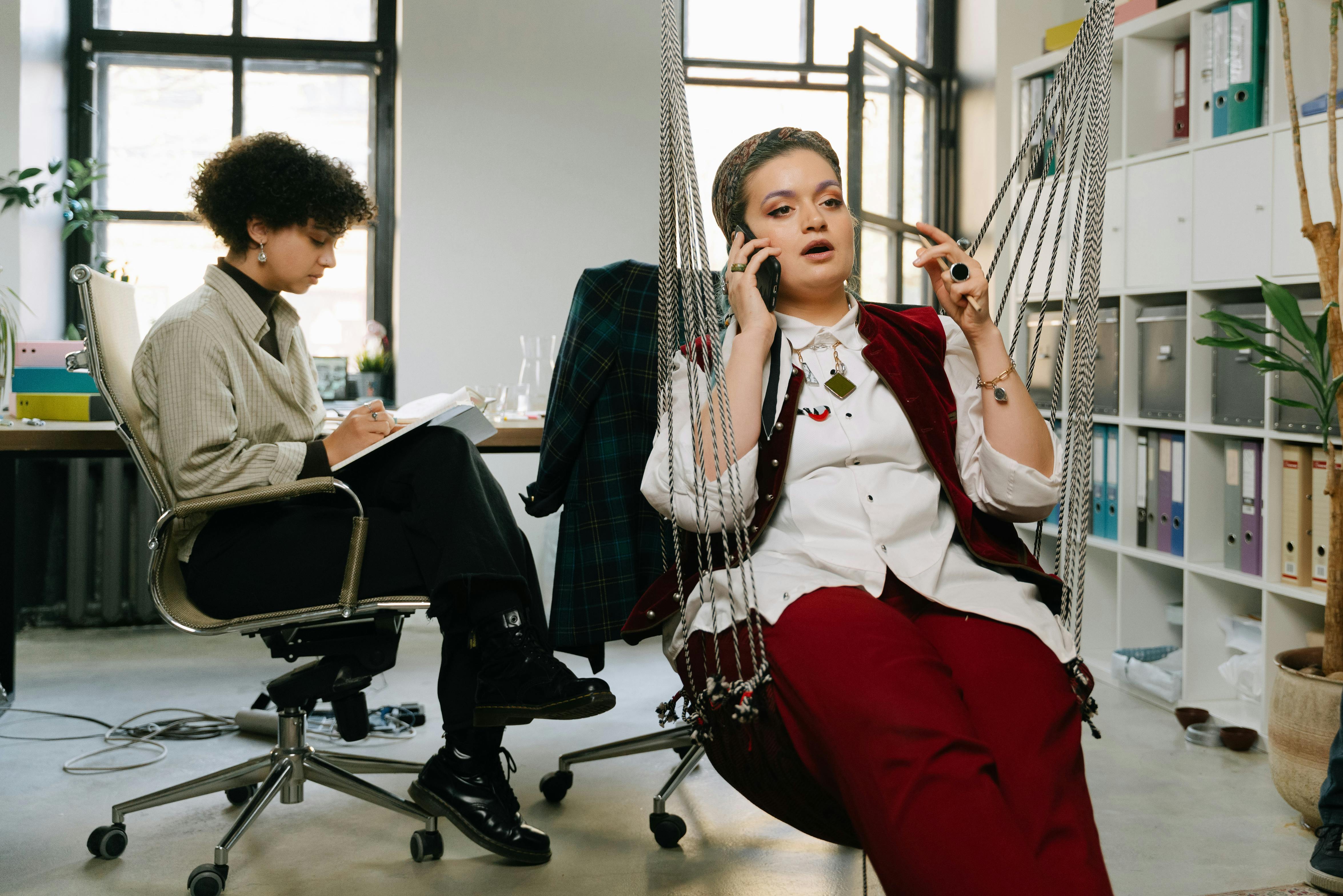 a woman on a phone call in the office