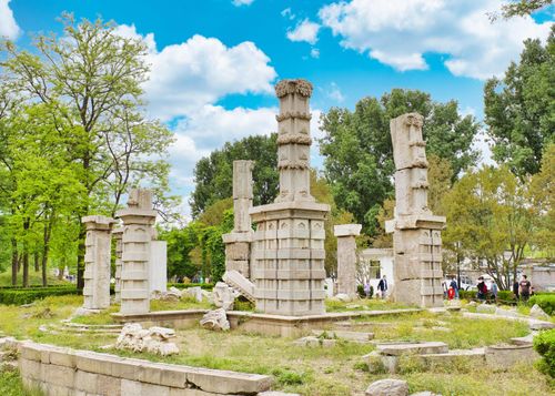 Free Explore the historic ruins of Yuanmingyuan Park set amidst lush greenery in Beijing, China. Stock Photo