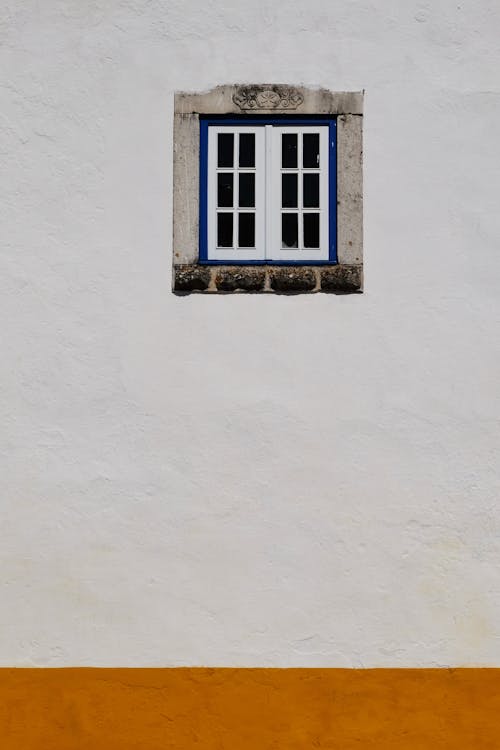 Free Window on White Concrete Wall Stock Photo