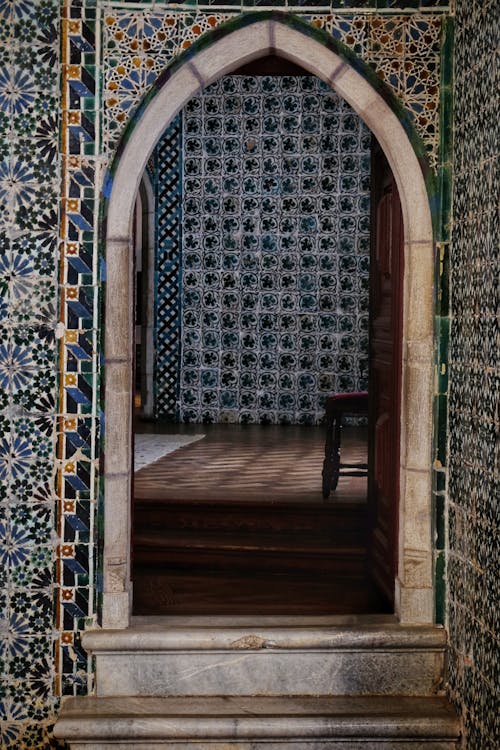 Symmetrical View of an Arch Entrance and Oriental Decorative Tiles