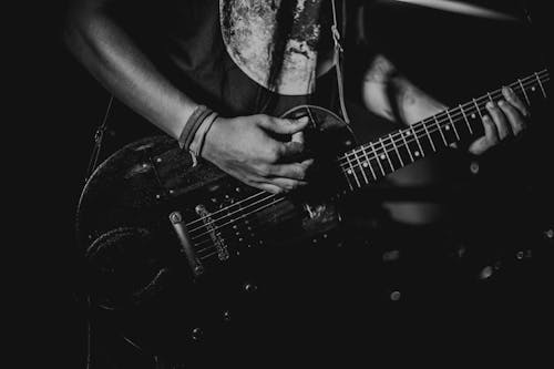 Free Man Playing Guitar Stock Photo