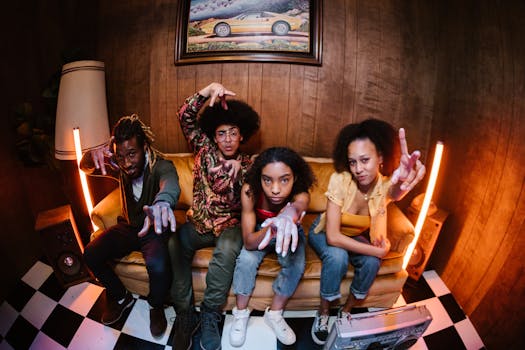 Group of diverse young friends posing playfully in a vintage room with retro decor.