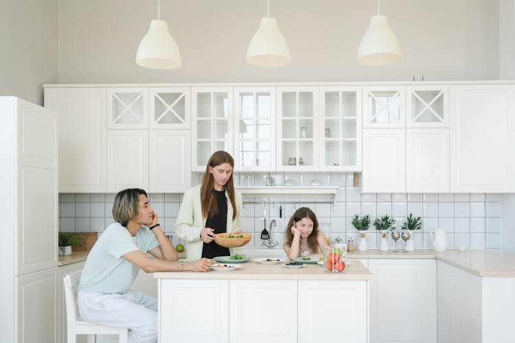 A Man Serving Breakfast For His Family