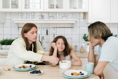 Free Man Sharing Food with the Girl Stock Photo