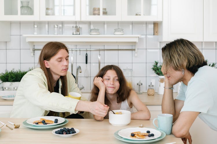 Man Sharing Food With The Girl