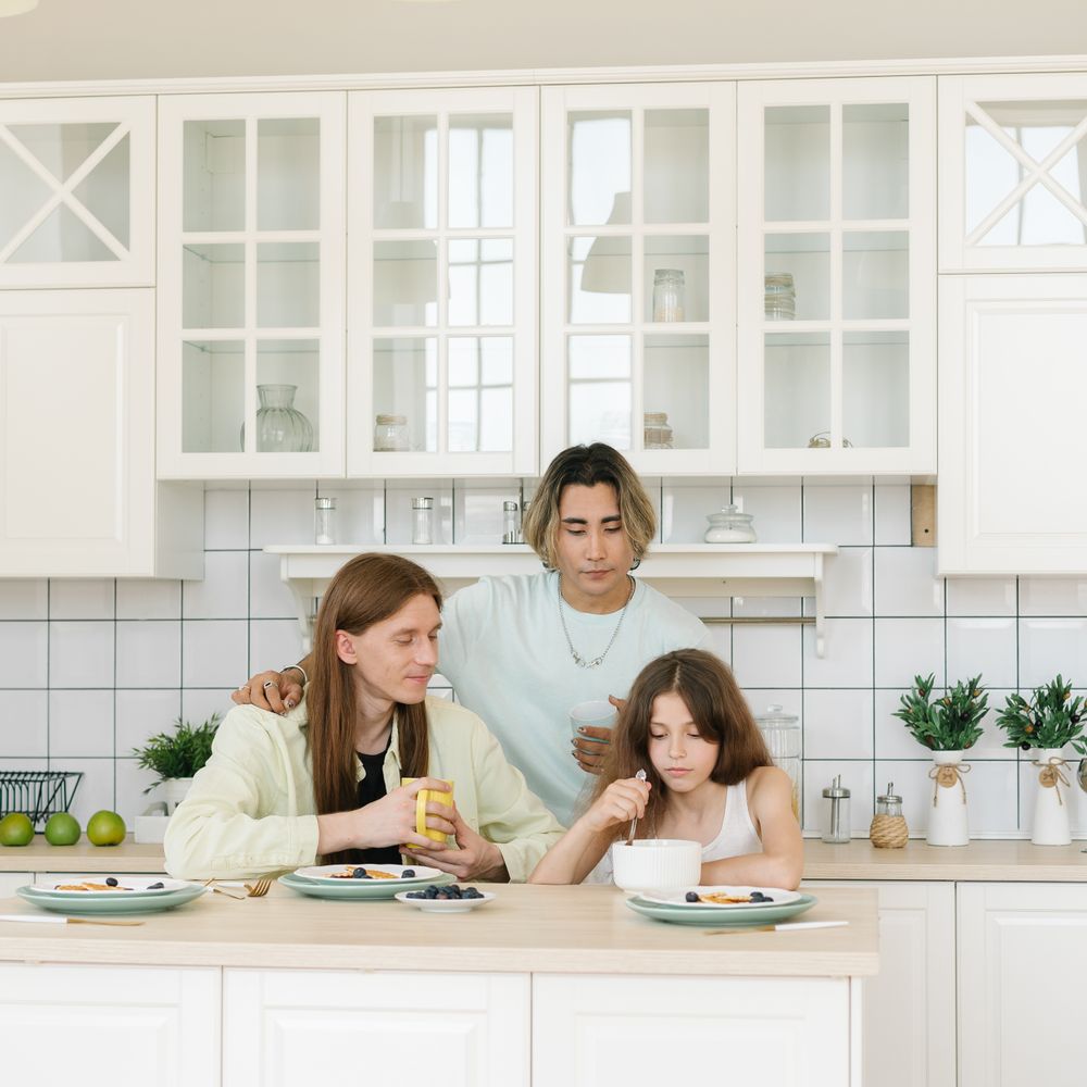 Kitchen Spraying in Denmark Hill — a decorator at work mid-project