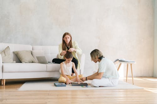 Free A Same Sex Couple Spending Time with Their Daughter Stock Photo