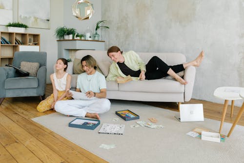 Free A Happy Family in the Living Room Together Stock Photo