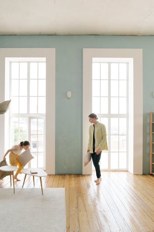 A Family Having Fun in a Pillow Fight