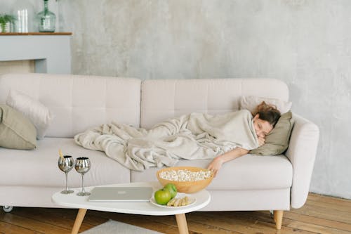 Free A Girl Lying on the Couch Stock Photo