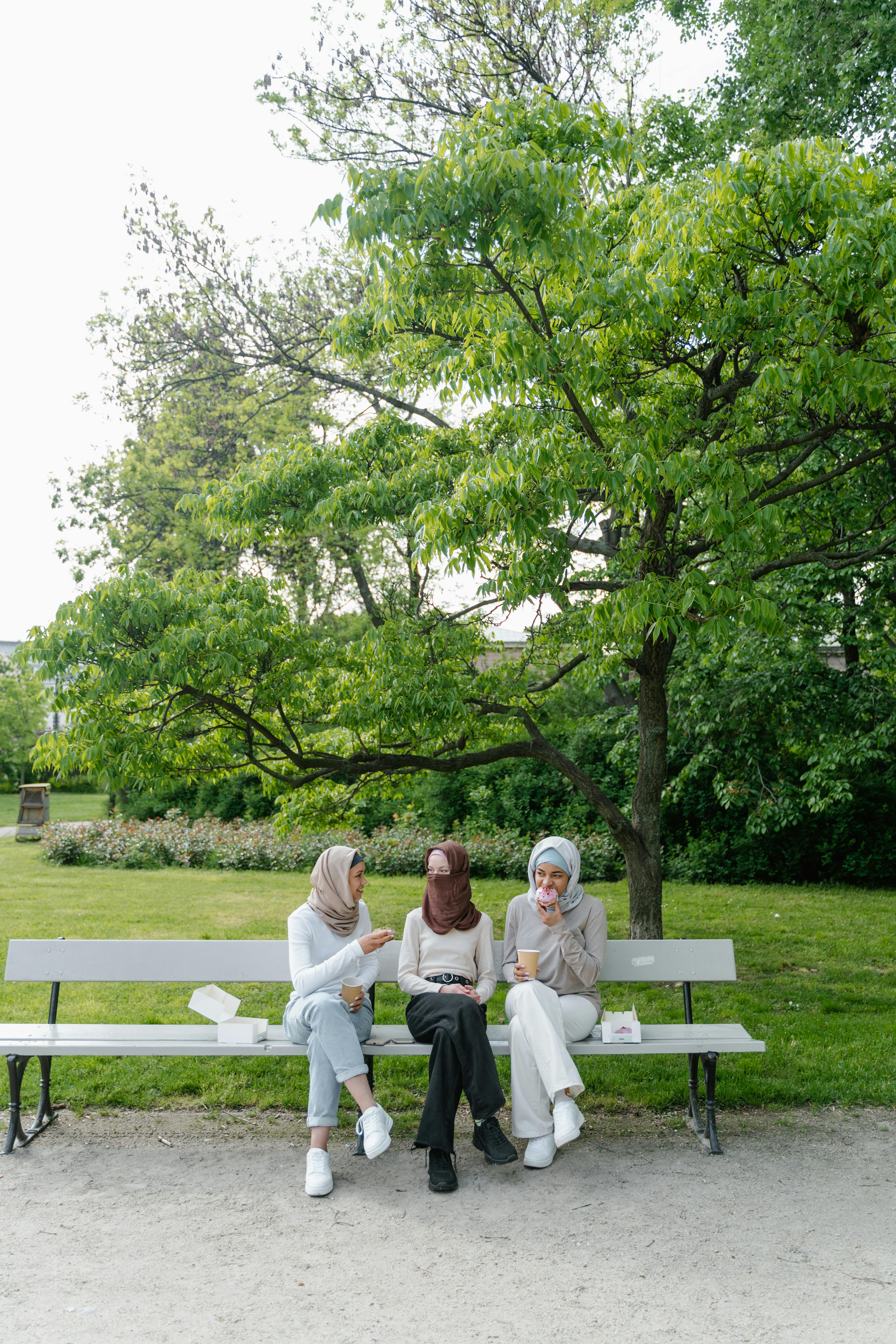 women sitting on the bench