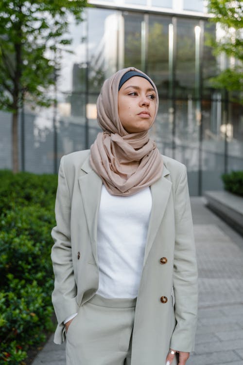 A Woman Wearing a Hijab and a Suit