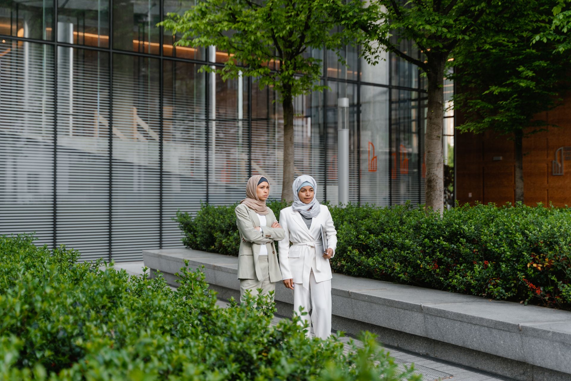 Women Standing Near the Building
