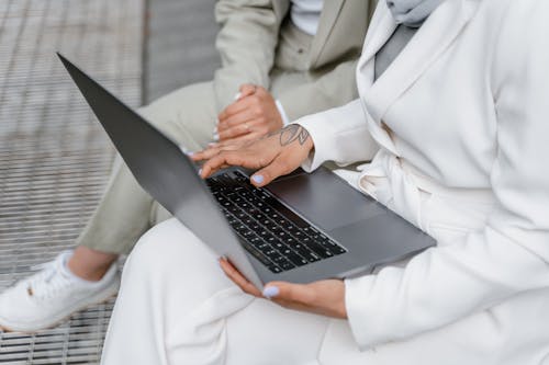Free Person holding Laptop Stock Photo