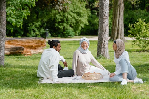 A Man and Women Doing Picnic Together 