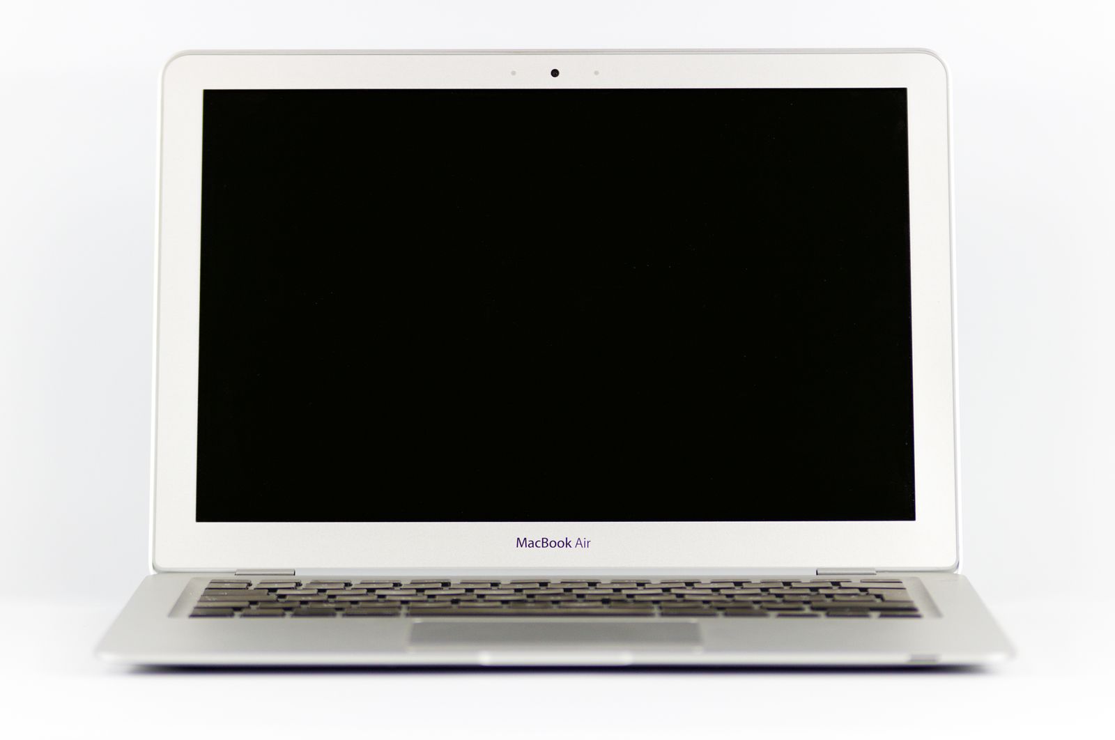 Person using a laptop while arranging local Mac repair