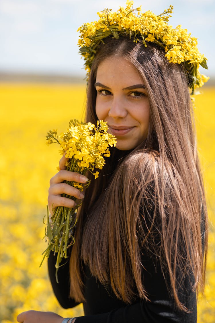 Woman Holding Yellow Angels Breath Flowers