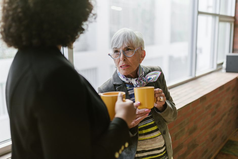 older adult interacting with a companion older adult interacting with a companion