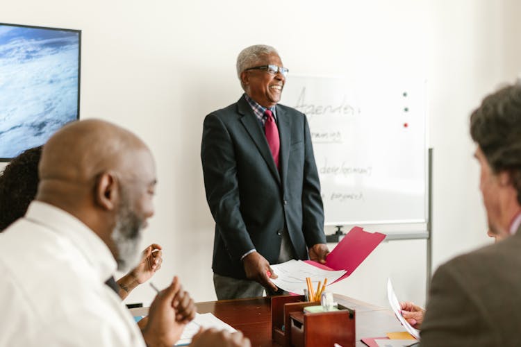 Boss Presenting In A Meeting