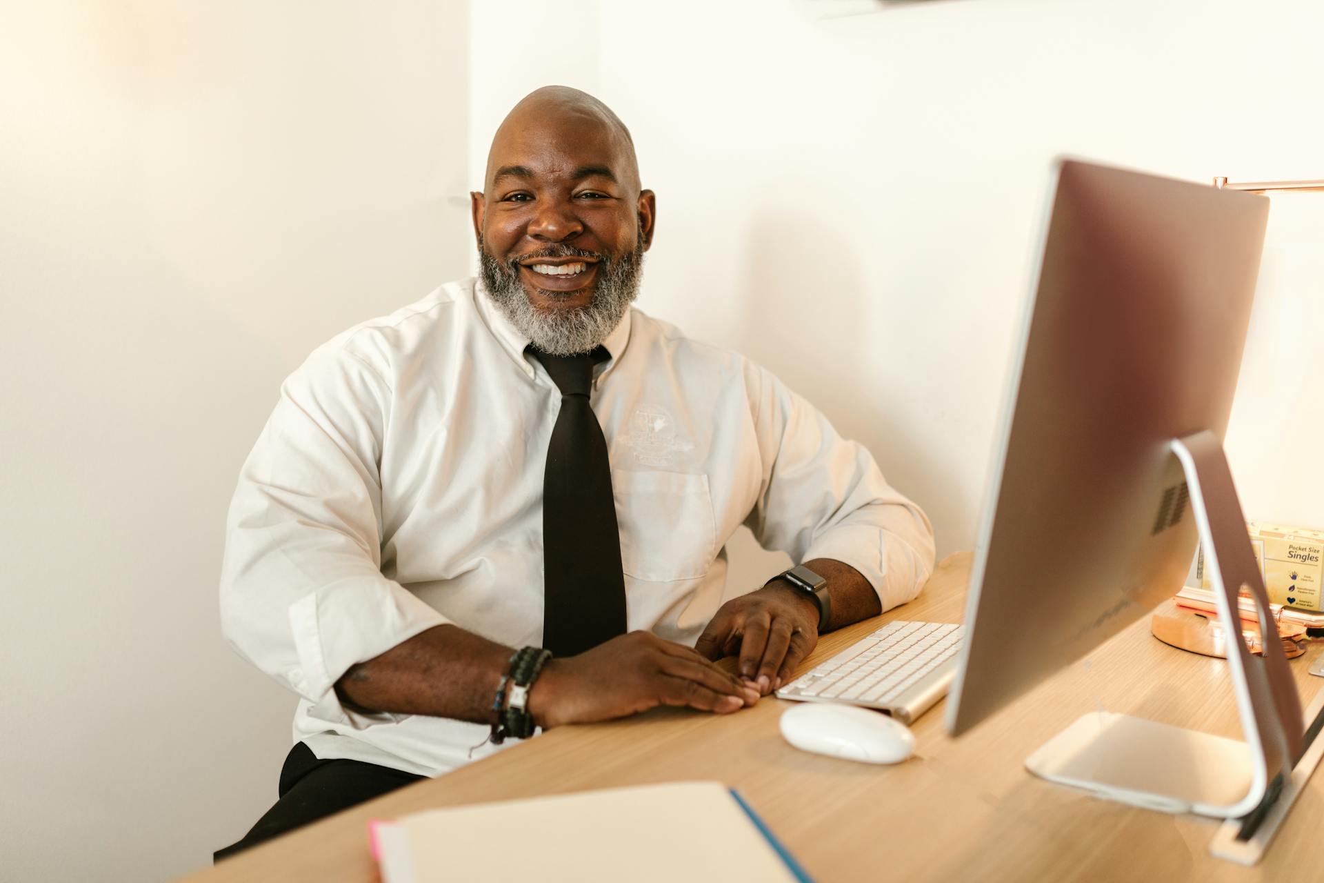 A Bearded Man Wearing a Corporate Attire in an Office