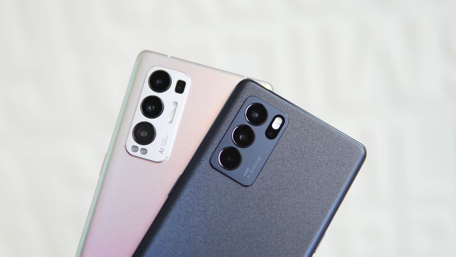Close-up of two smartphones showcasing triple camera technology in modern design.