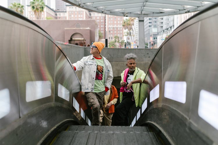 Men On Escalator