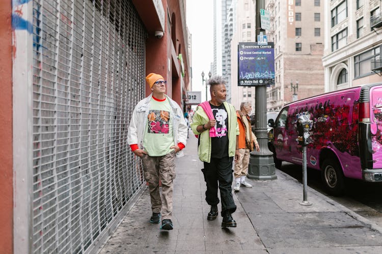 An Elderly Men Walking On The Street