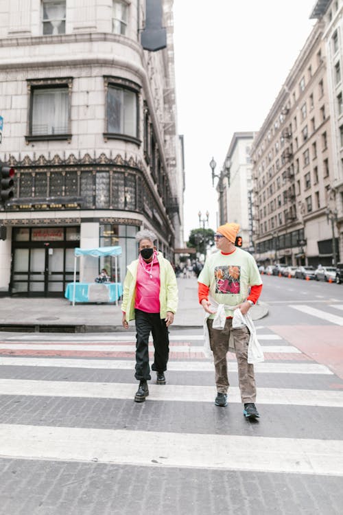 Stylish Men Walking on Pedestrian Lane