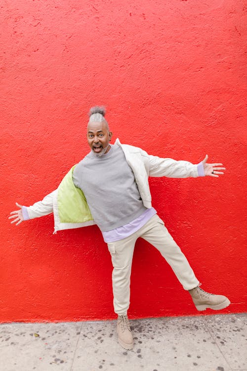 Man Posing on Red Background