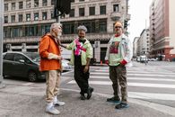 Elderly Men Wearing Stylish Clothing Standing on Street Corner