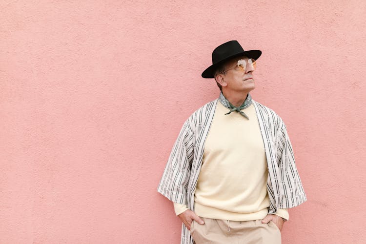 Man Wearing Black Fedora Hat Looking Up