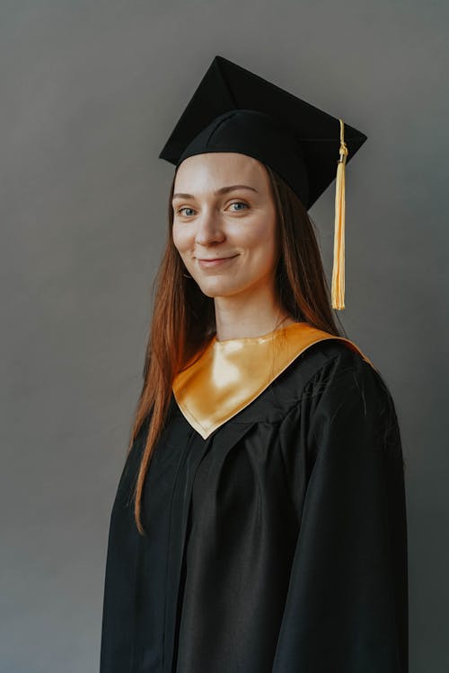 Free Woman in Graduation Gown  Stock Photo