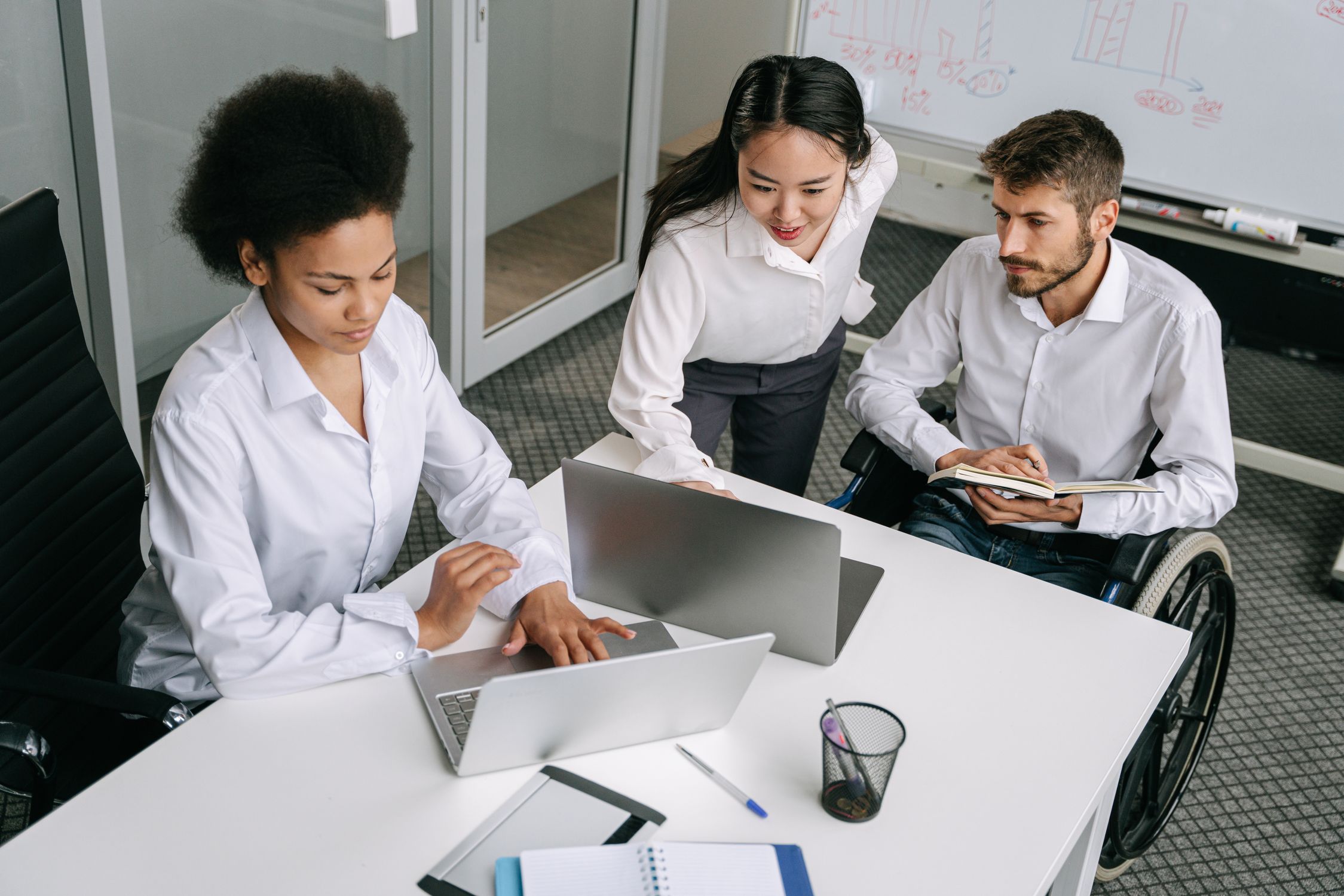 High Angle Shot of People Using Laptops · Free Stock Photo