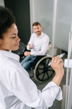 A diverse team working together in a modern office, promoting inclusivity and accessibility.
