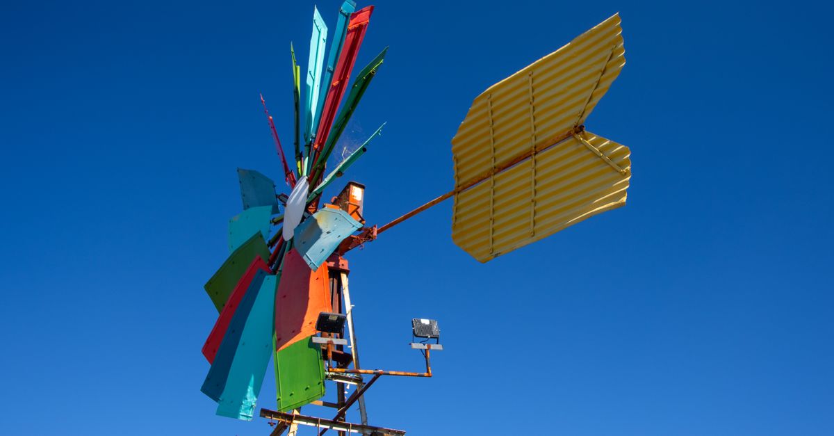 Yellow Red and Green Windmill Under Blue Sky · Free Stock Photo