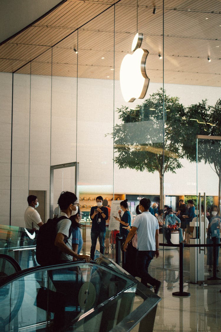 People Walking On Apple Store