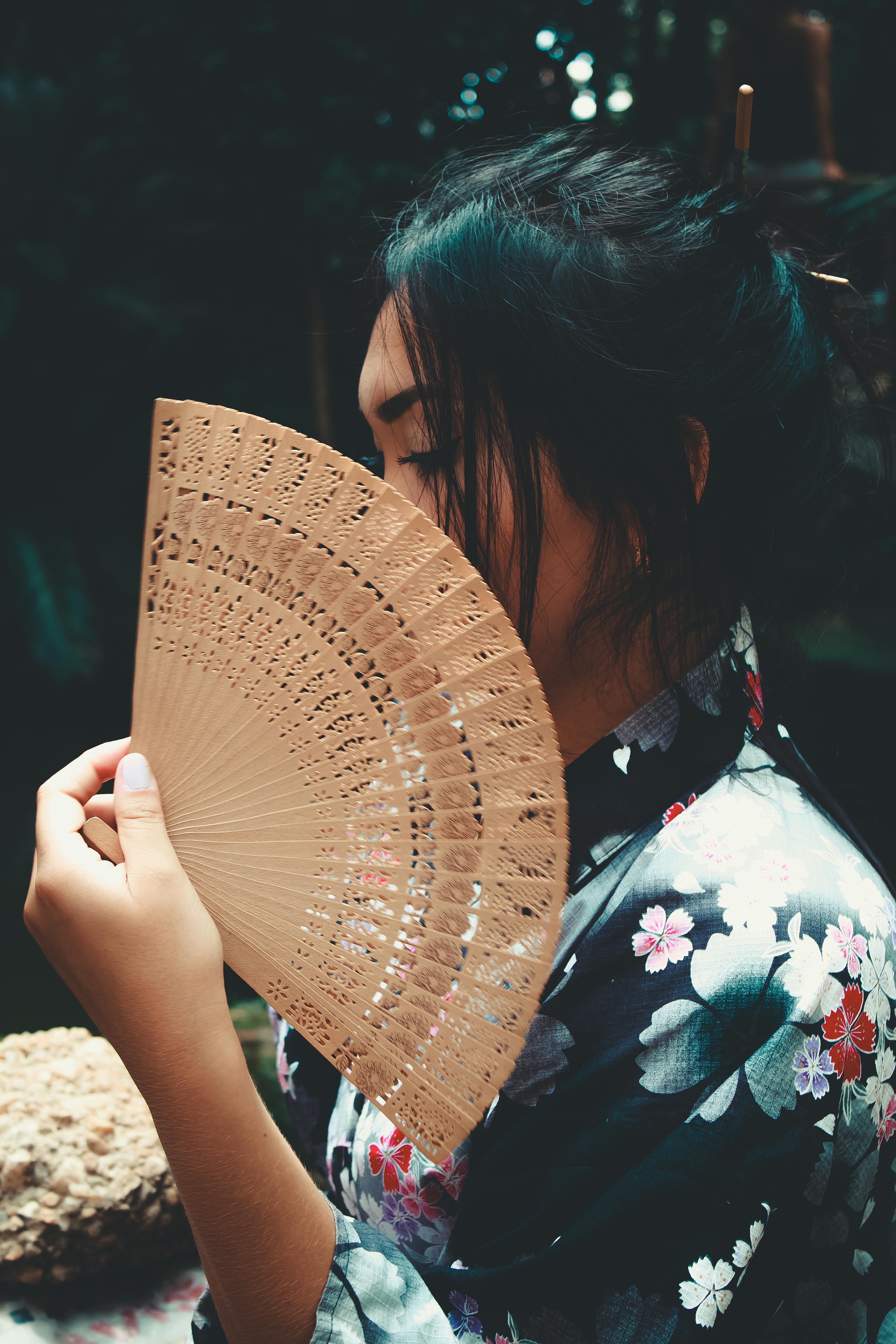 Japanese Woman Holding Brown Hand Fan · Free Stock Photo