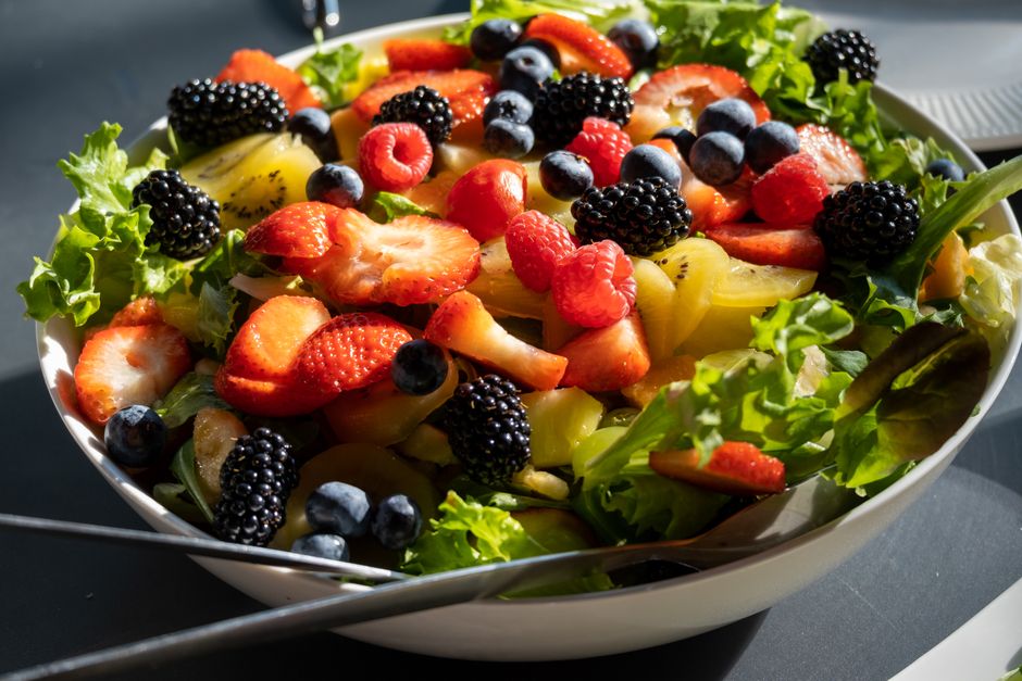 fresh greens and fruits on a kitchen counter - amazing healthy smoothie recipes fresh greens and fruits on a kitchen counter - amazing healthy smoothie recipes