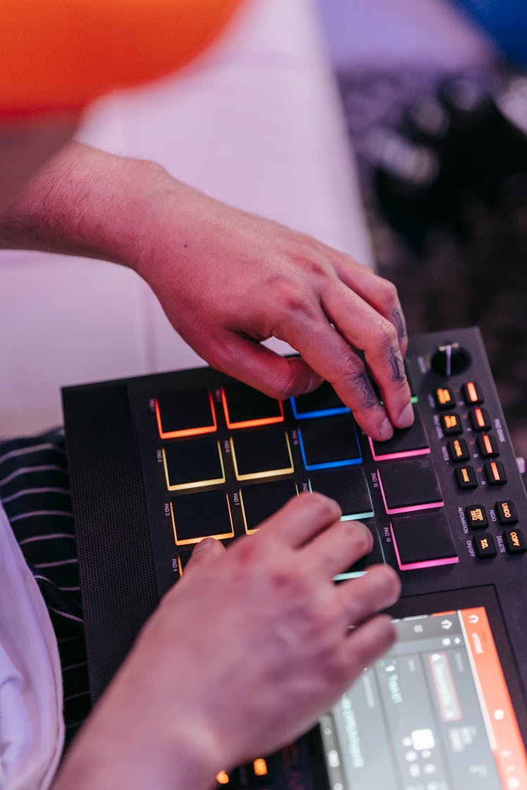 A Person Using A Music Sequencer