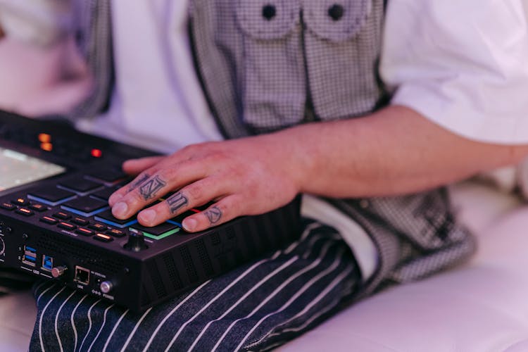 A Person Using A Music Sequencer